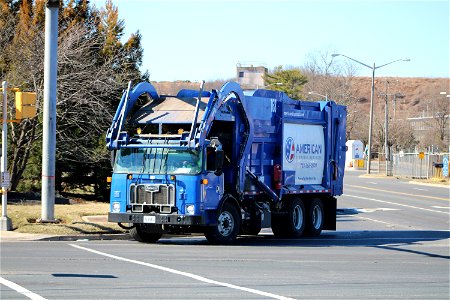 American Disposal truck 168 | Brand New Autocar ACX64 Mcneilus TG-CNG Atlantic series front loader photo