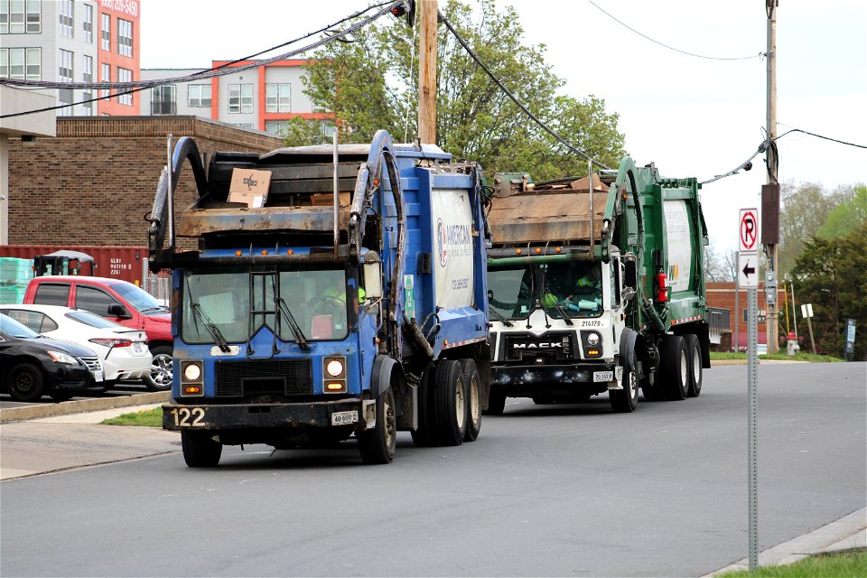 Trucks Dumping Recycling