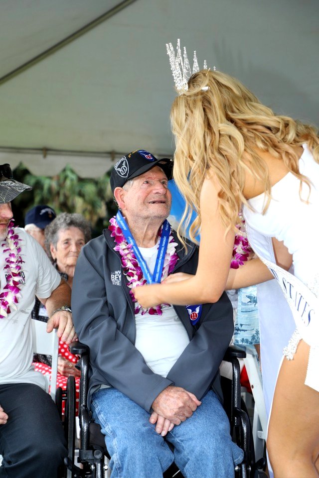 Miss United States with WWII Veteran at 2022 Pearl Harbor Parade Ceremony