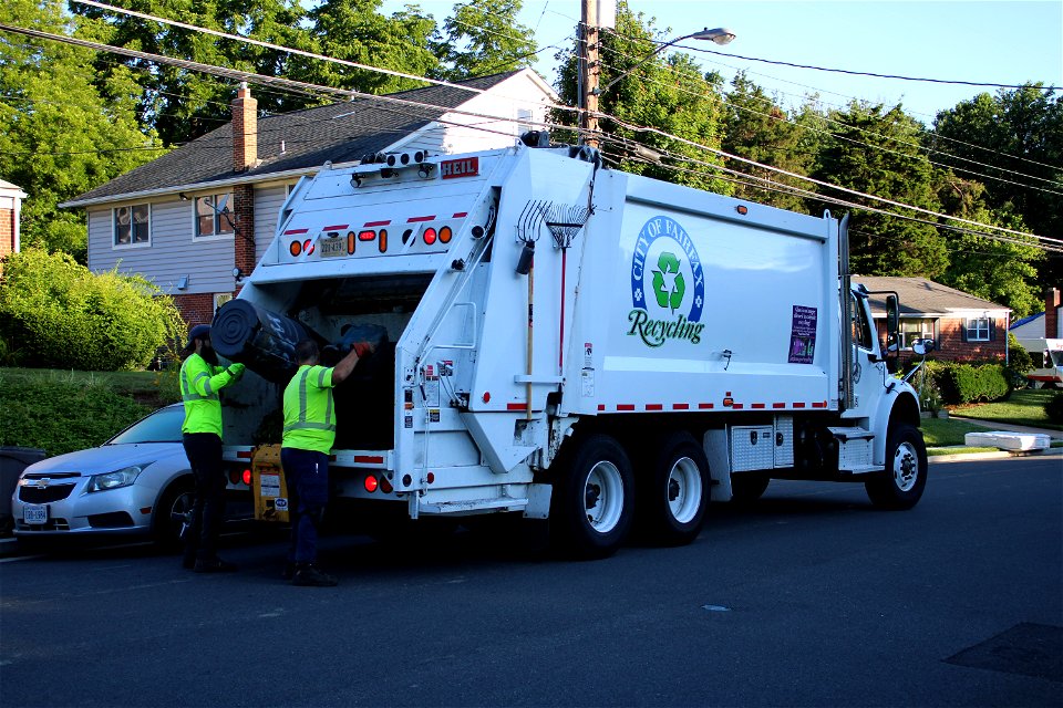 Recycling truck doing yard waste photo