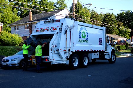 Recycling truck doing yard waste photo