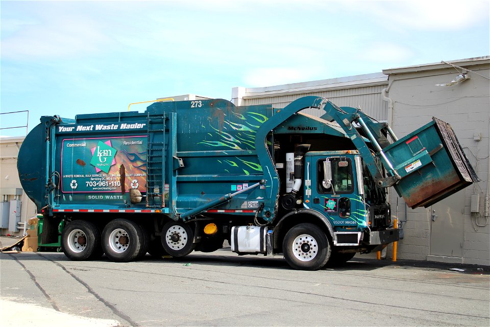 KMG Hauling truck 273 doing trash late in the afternoon