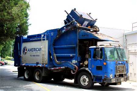 American Disposal truck 152 doing trash