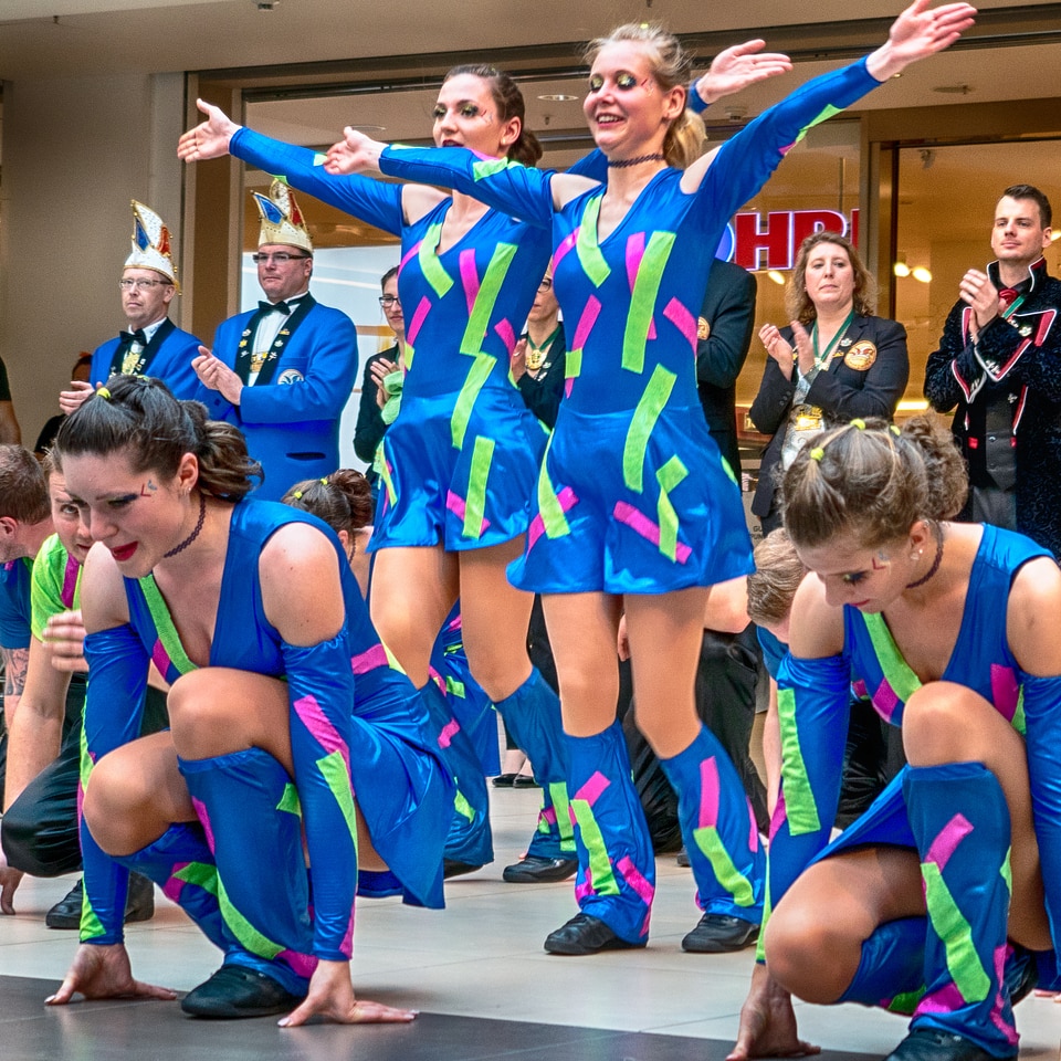 Cheerleader and dancer performing on stage