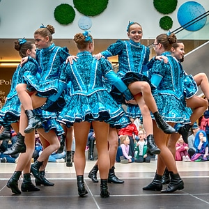 Cheerleader and dancer performing on stage