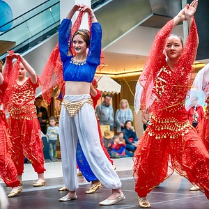 Cheerleader and dancer performing on stage