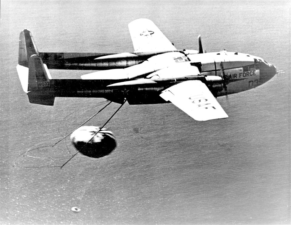 Fairchild C-119 Flying Boxcar picks up a Corona capsule