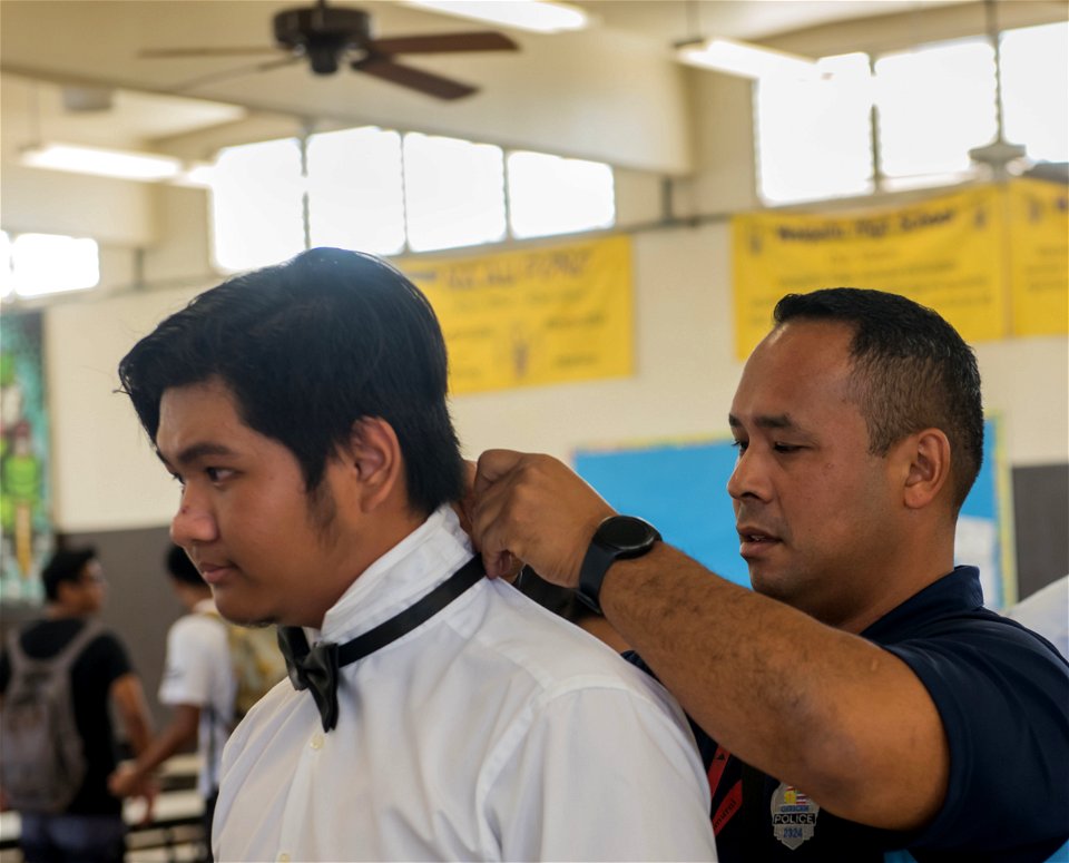 FBI Honolulu Adopt-a-School: Police Officer Assists Student Presenter