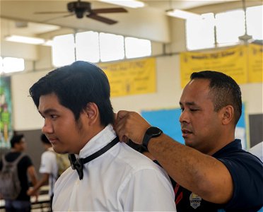 FBI Honolulu Adopt-a-School: Police Officer Assists Student Presenter