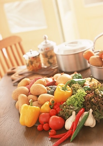 Different fresh vegetables on the table photo