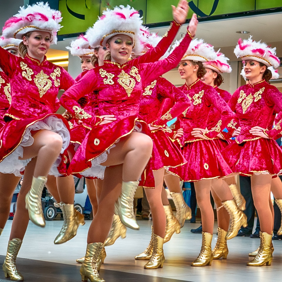 Cheerleader and dancer performing on stage