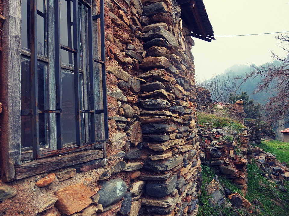 stone shelter in the woods