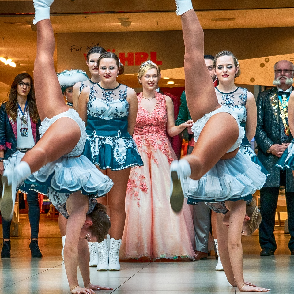 Cheerleader and dancer performing on stage