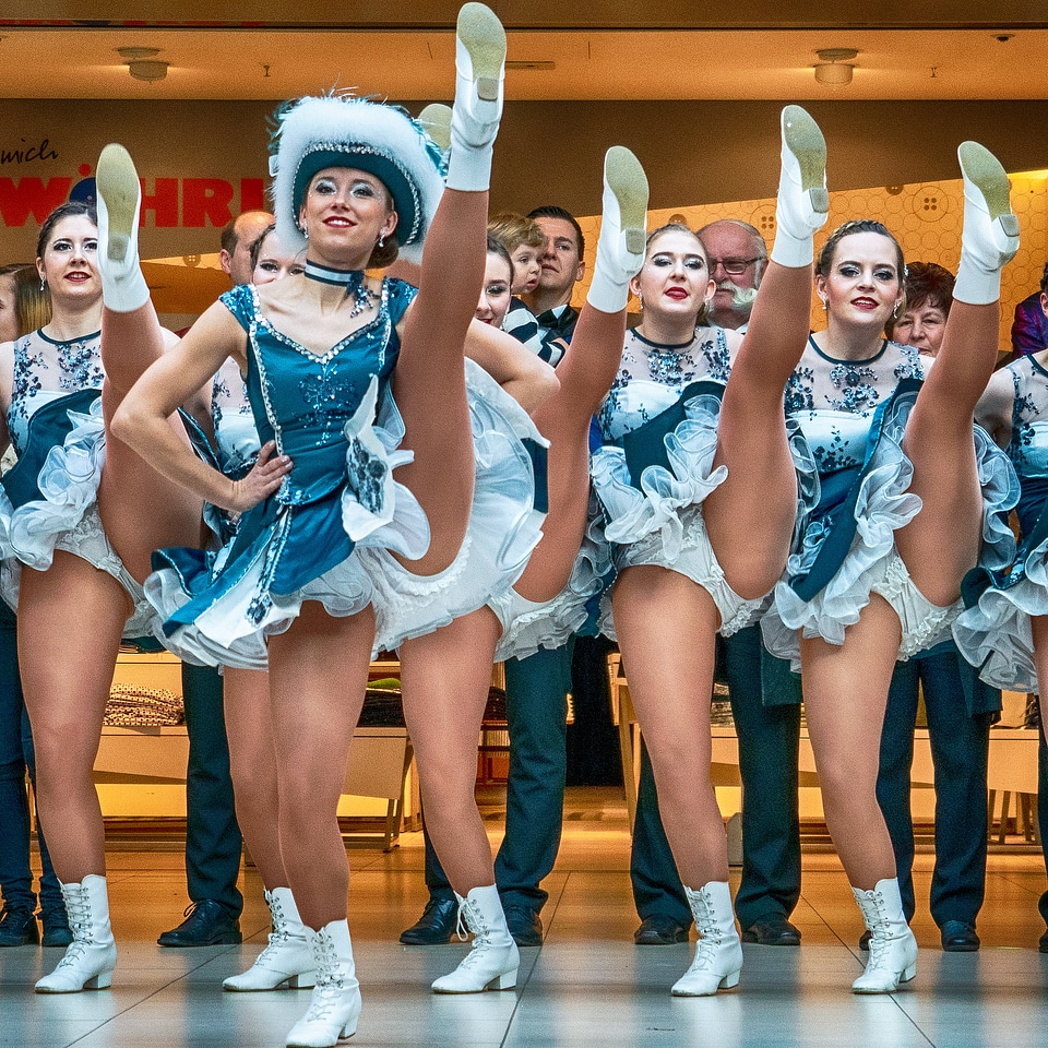 Cheerleader and dancer performing on stage
