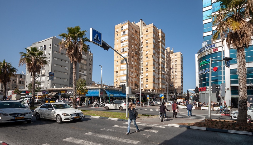 people walk on street pedestrian crossroad in the city