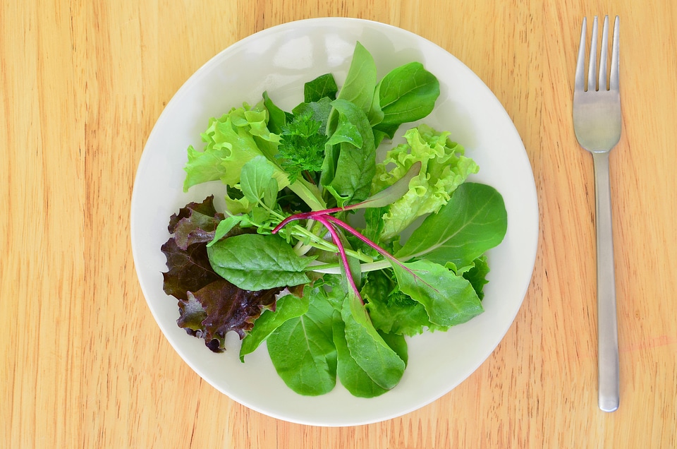 Fresh baby greens in a salad