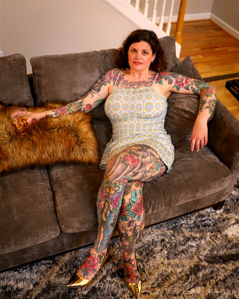 Heavily Tattooed Woman