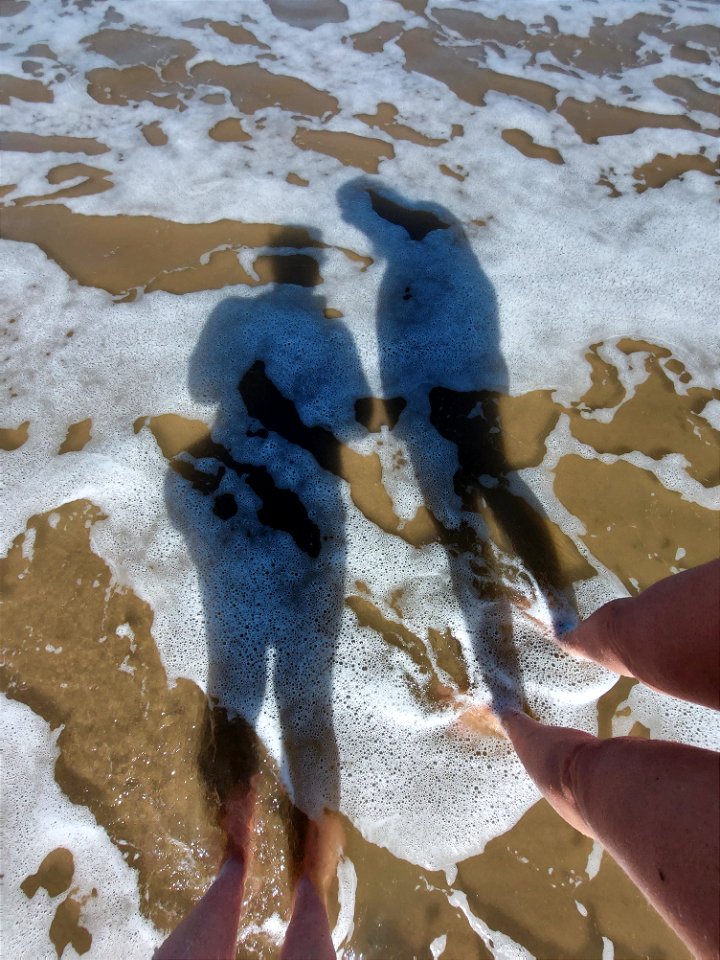 Shadows on the beach photo