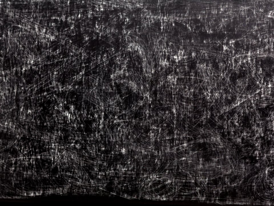 white cardboard painted black with scratches