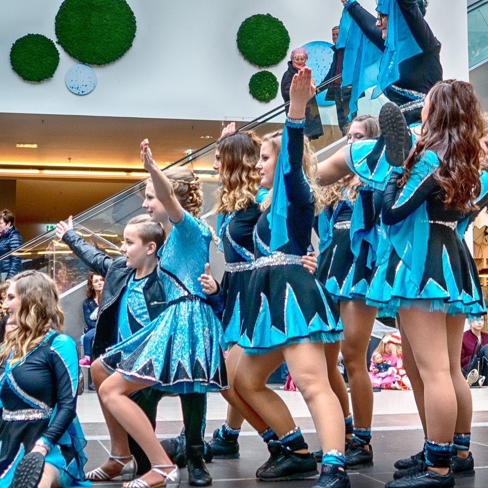 Cheerleader and dancer performing on stage