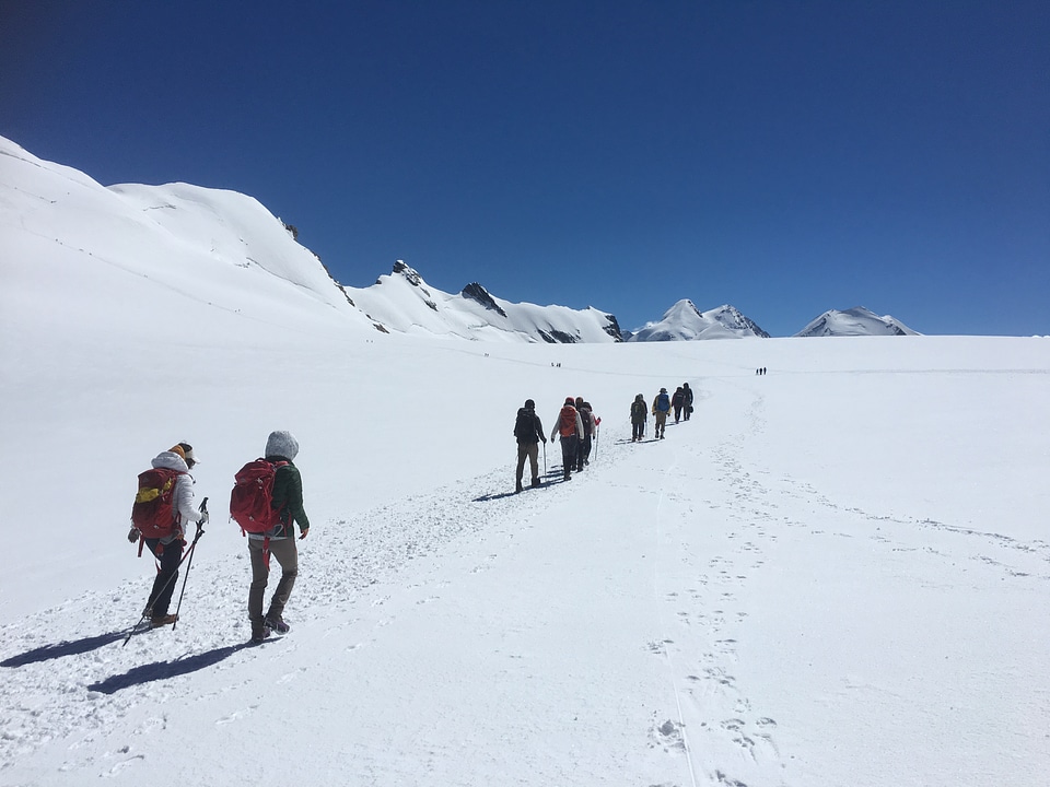 hikers team in the mountains. Matterhorn. Swiss Alps photo