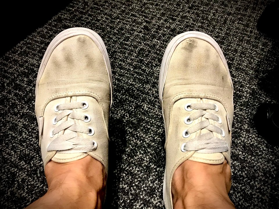 Dirty white vans get a small hole