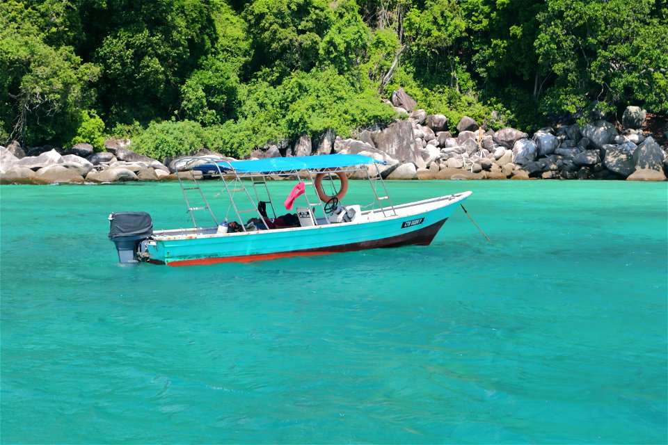Old Sea Taxi Floating on Crystal Clear Water on Tioman Island, Malaysia