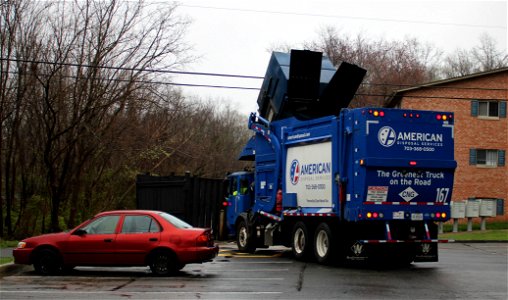American Disposal truck 167 apartment trash