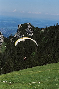 Paraglider in the blue sky at the Kampenwand photo