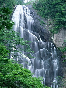 Stair waterfall in forest photo