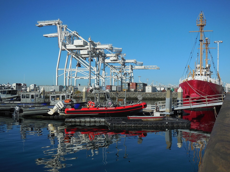 Oakland harbor with giant cranes or jack hammers