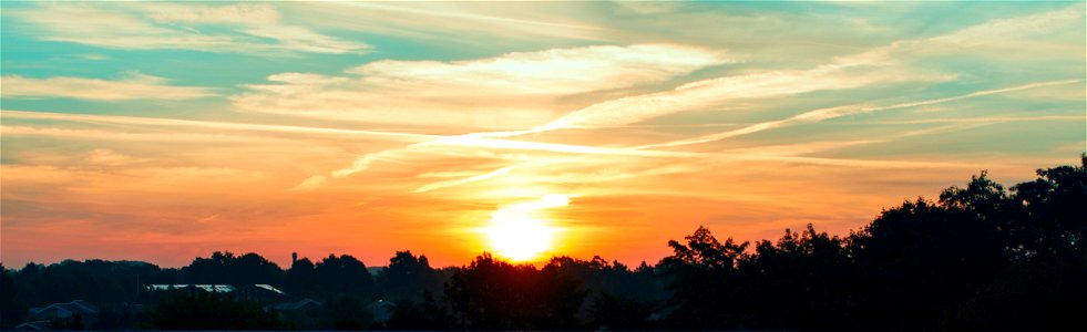 Sunrise in denmark (orange and teal) photo