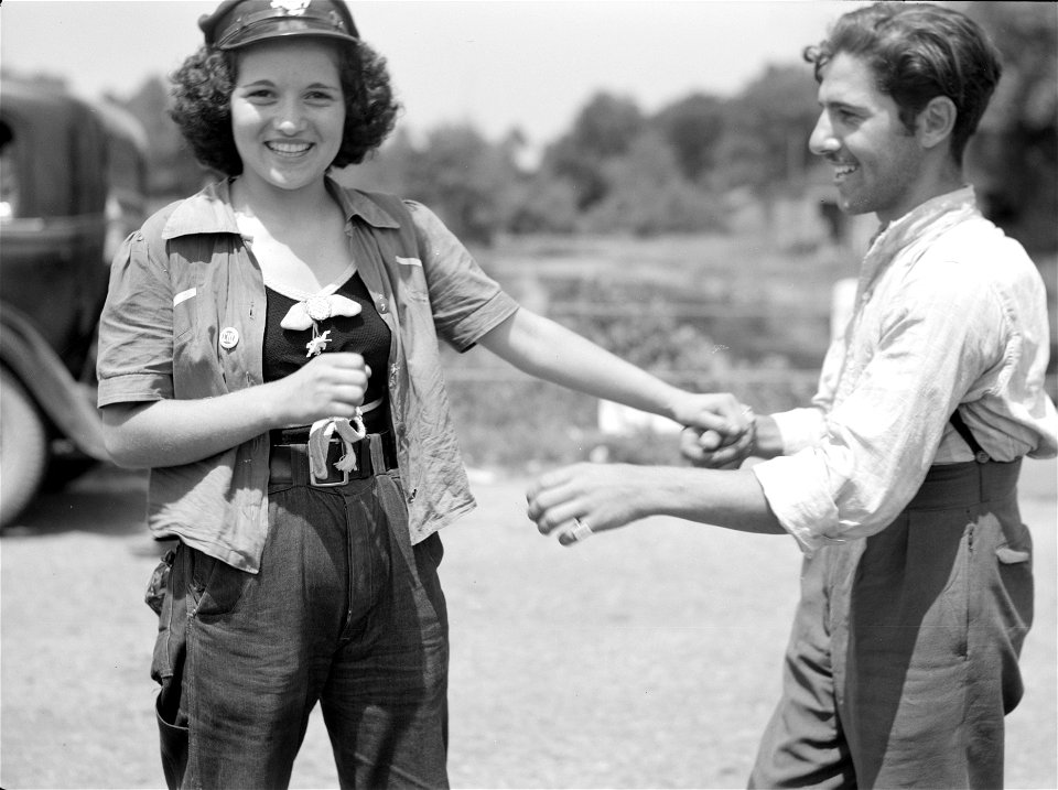 Old photo of a Woman and man happy together. Young love. Also, possibly in the picket line at the King Farm strike by Morrisville, Pennsylvania