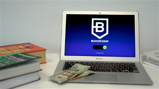 Blockchain application on a laptop photo