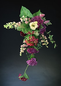 Vintage bunch of garden flowers isolated on black background.