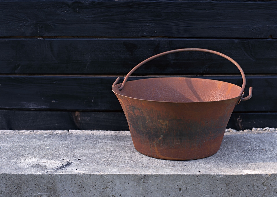 Decorative bright garden old bucket