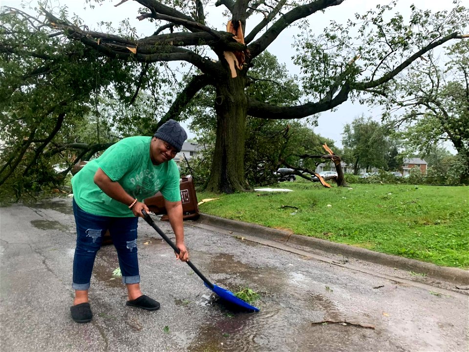 A woman still smiling after the storm. (PHOTO PFPD)