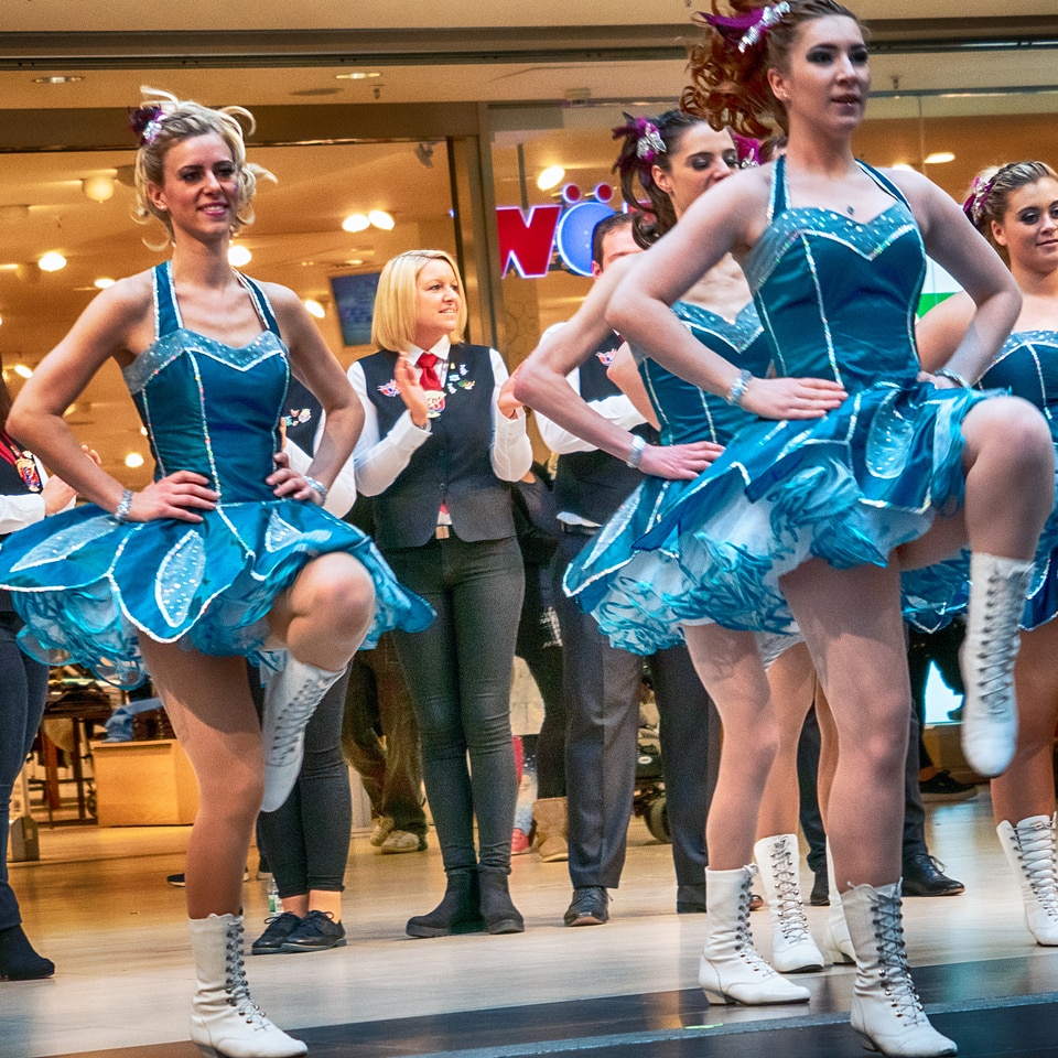 Cheerleader and dancer performing on stage