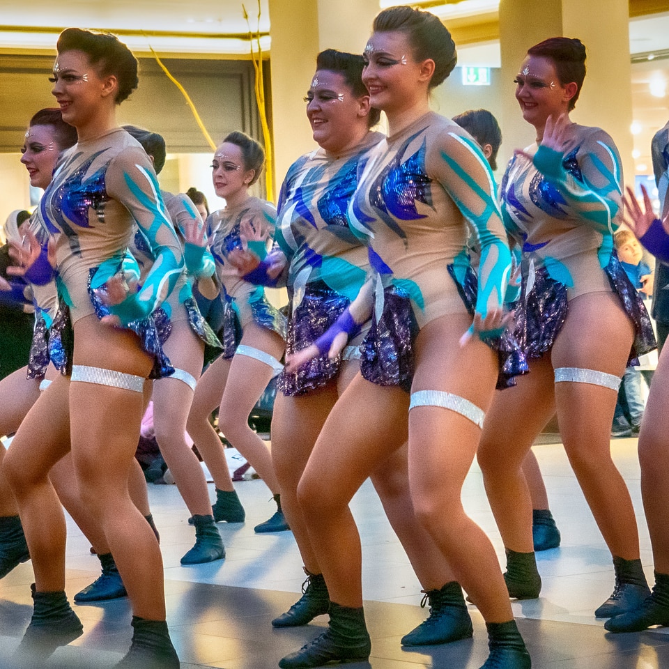 Cheerleader and dancer performing on stage