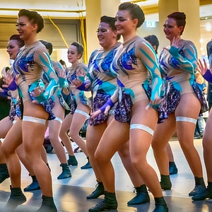 Cheerleader and dancer performing on stage