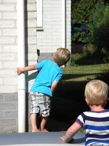 Kids hide and seek peekaboo photo