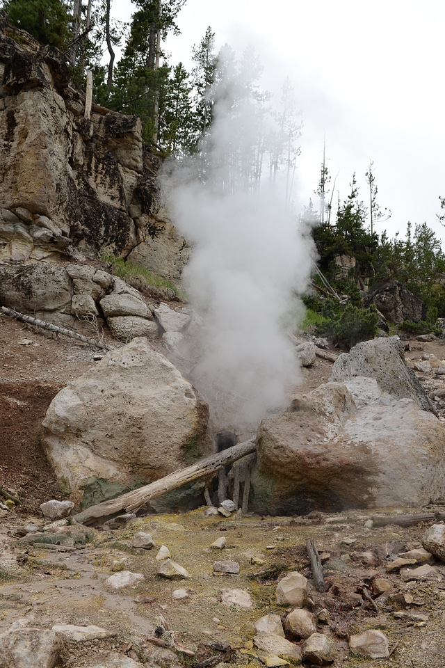 Hot springs and geyser basin landscape
