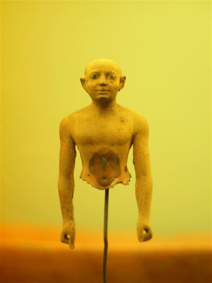 Wooden statuette of a man
