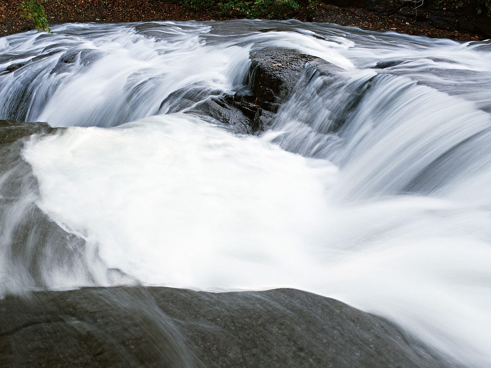 The Image Of The Flowing Water Of Stream