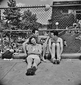 Relaxing on the edge of the municipal swimming pool photo