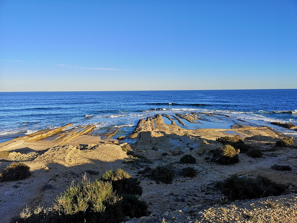 sandy Cala Mesquida bay with beach