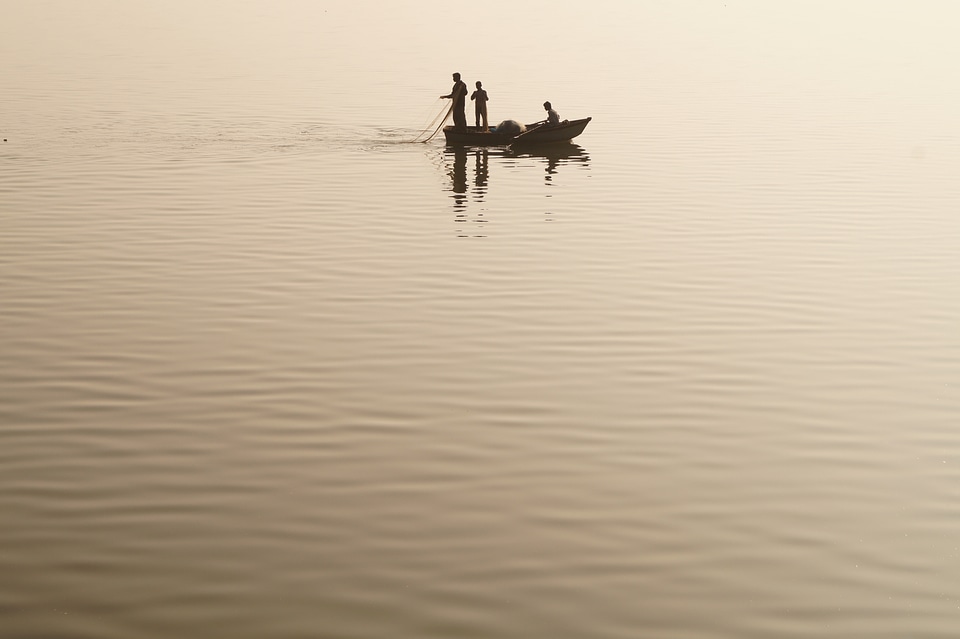 Lake fishing boat calm photo