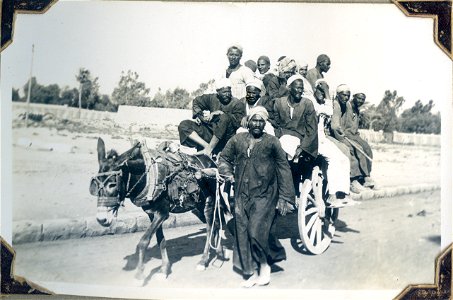 North Africans with mule and wagon photo