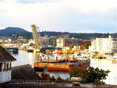 Johnson Street Bridge opens for a barge to pass through