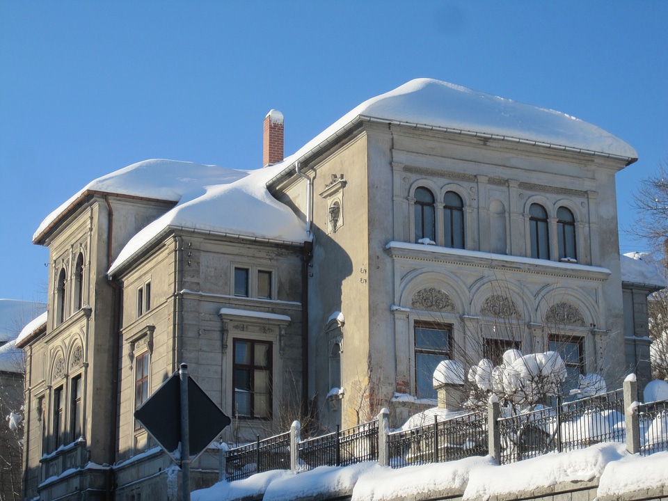 Roof of a house covered with snow